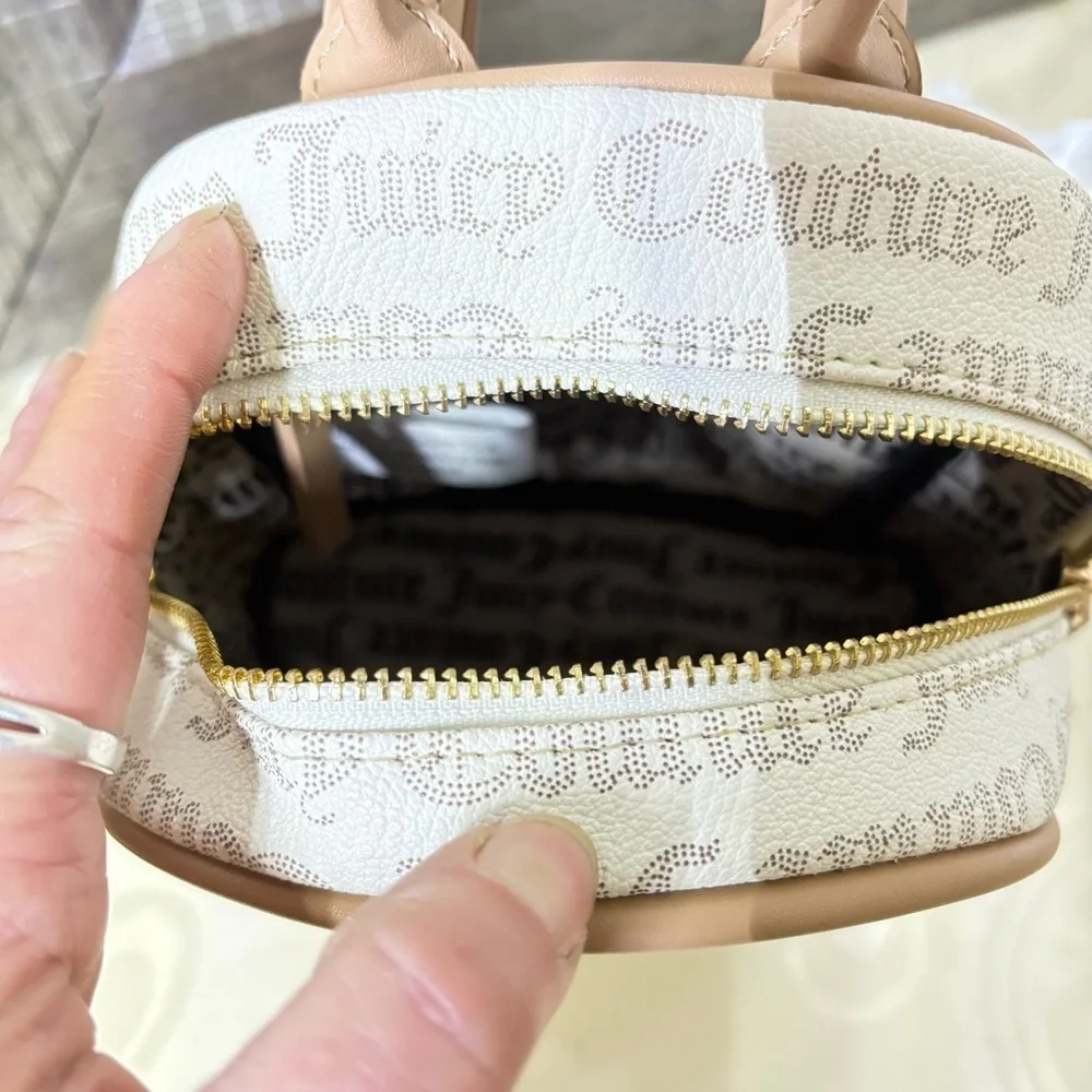 Juicy Couture pecan white and tan mini backpack